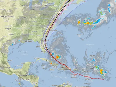 Hurricane track and forecast paths from eastern Caribbean, across Cuba, toward US East Coast