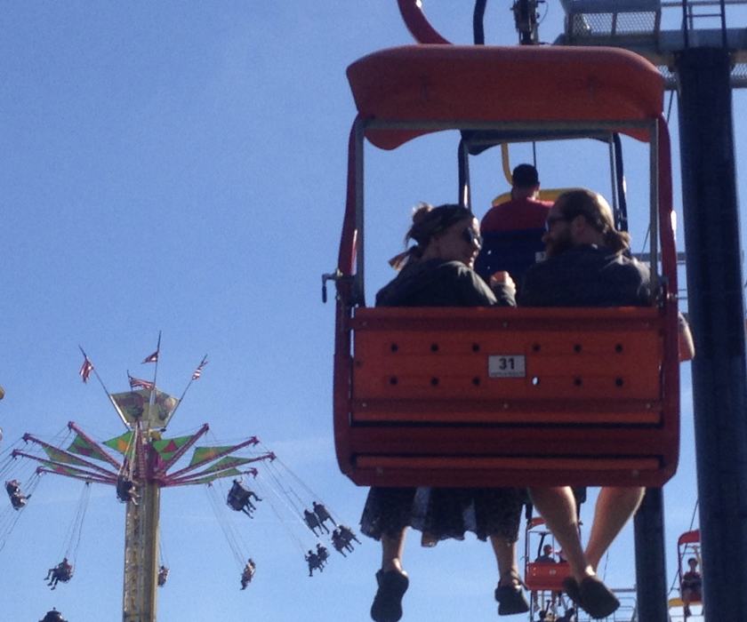 People on rides at the NC State Fair. 