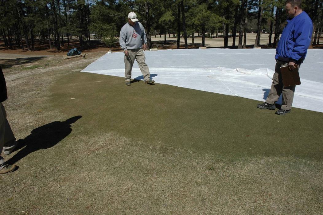 Turfgrass professionals taking a peek under the covers
