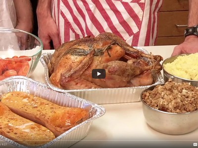 still image from the Homegrown video showing cooked turkey, squash, mashed potatoes and stuffing