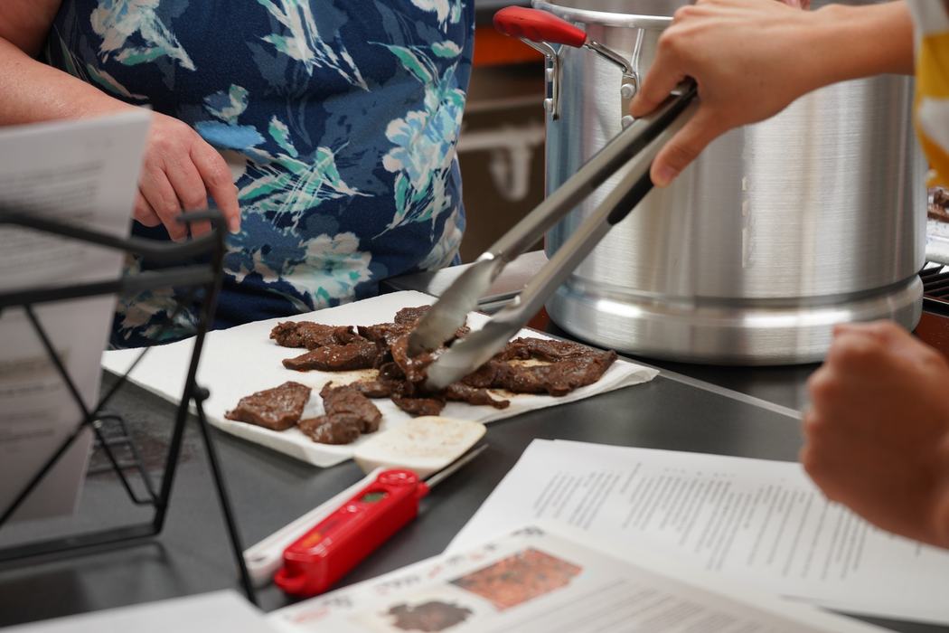 Removing excess liquid from venison jerky