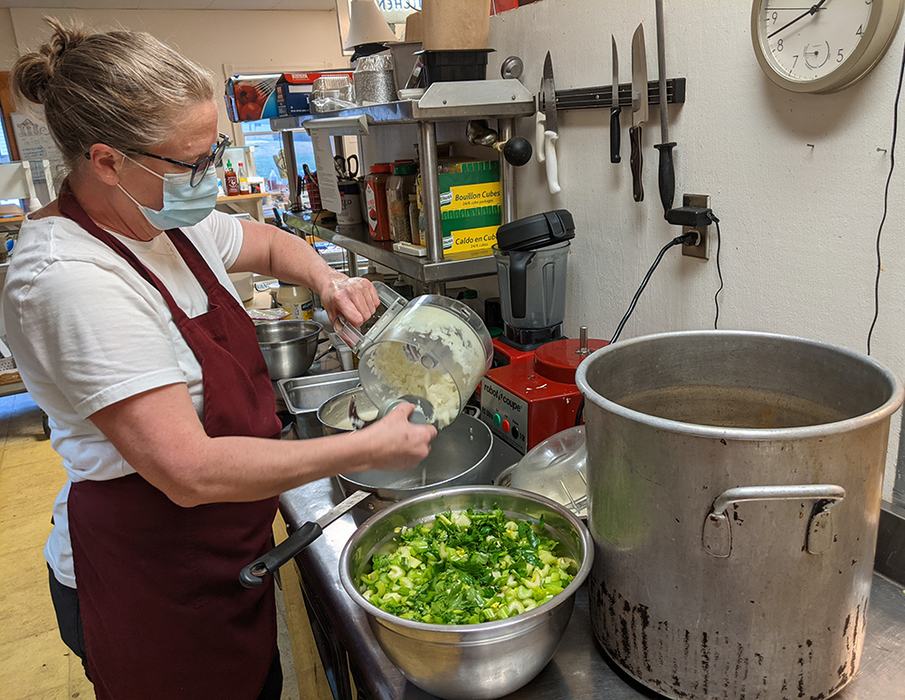 Sarah preps veggies for soup