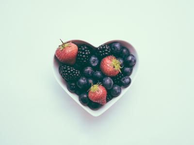 Heart shaped bowl full of berries