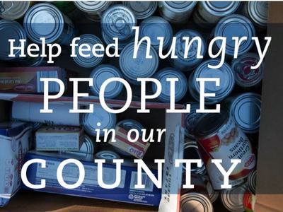 Box of canned food with text: "Help feed hungry PEOPLE in our COUNTY"