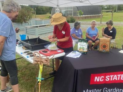 Wayne County Extension Master Gardeners volunteering at various Wayne County Extension gardening programs.
