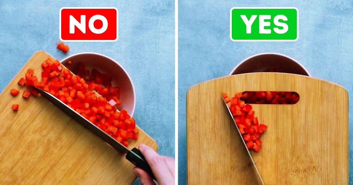 tomatoes on cutting board being put in a bowl