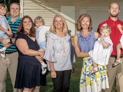 Braswell family standing outside