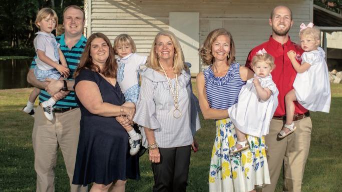 Braswell family standing outside