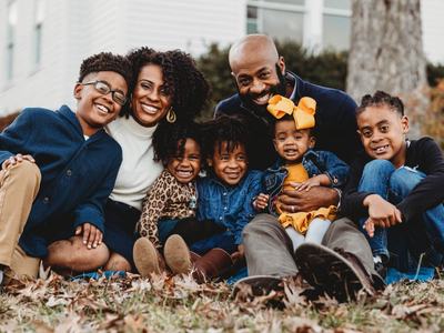 Jackson family seated outside
