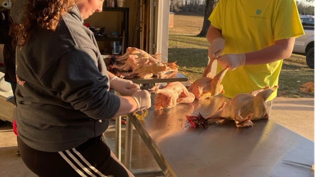 FFA members processing poultry