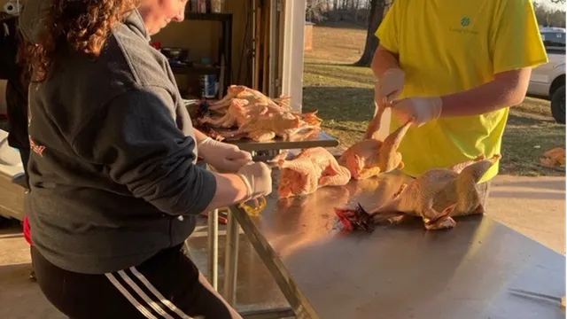 FFA members processing poultry