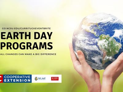 hands holding a small Earth advertising Earth Day Programs