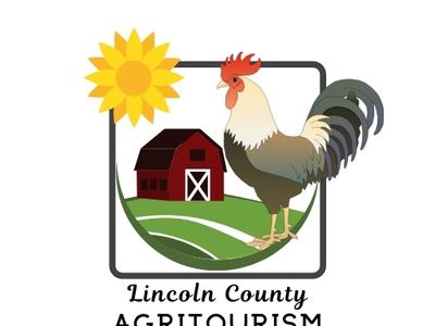 Rooster beside barn, sunflower and fields in frame; text "Lincoln County AGRITOURISM"