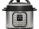 Instant Pot electric pressure cooker with digital display reading "04:00"