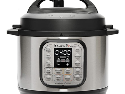 Instant Pot electric pressure cooker with digital display reading "04:00"