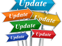 Cluster of colored arrow signs pointing various directions, each labeled "Update"