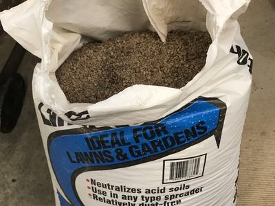 Pelletized Lime in a Blue and White Bag