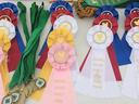 Award ribbons and medals labeled "Regional Chicken Project" with "Third Place" and "Fifth Place"