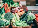 Farmers market vegetables: broccoli, carrots, zucchini, green beans, tomatoes, weighing scale