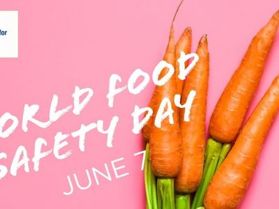 pink background with carrots that says "World Food Safety Day" June 7th