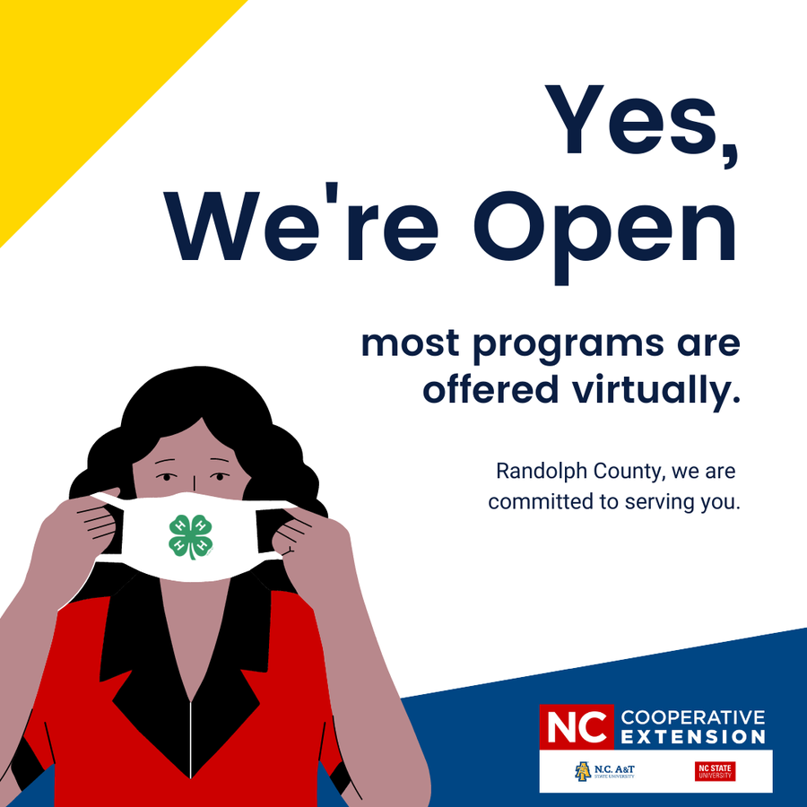 woman putting on mask with program information