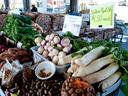 Farmers market stall with vegetables