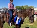 4-H with horse and ribbons