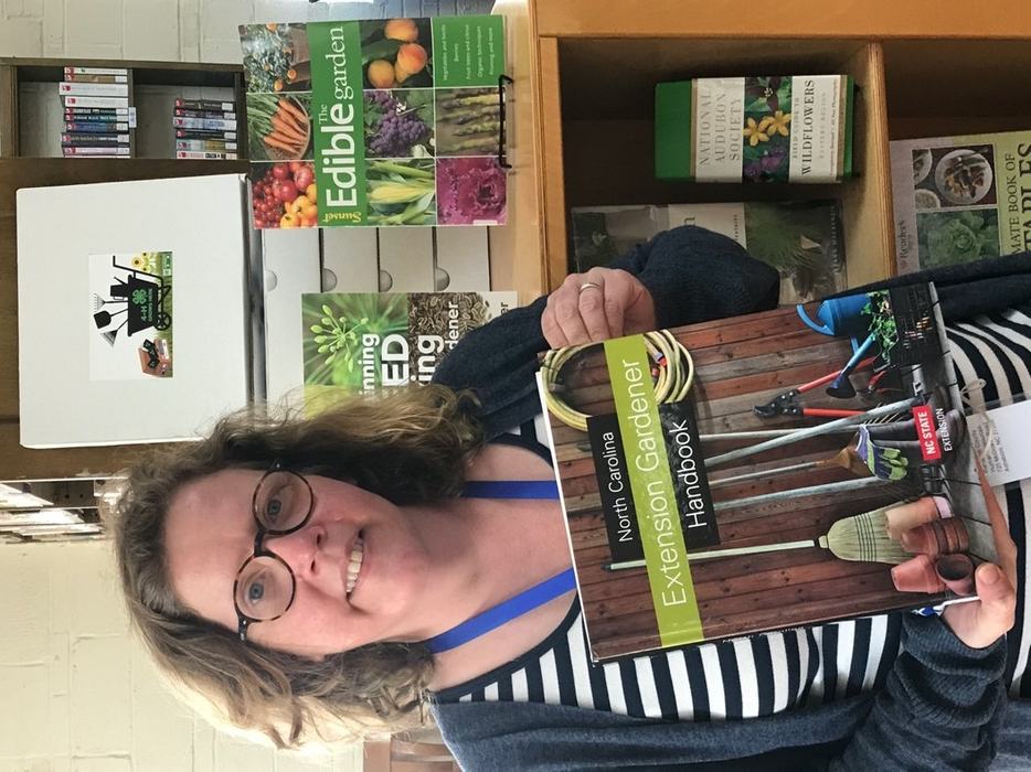 Librarian holding book