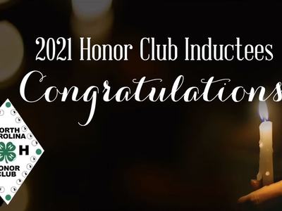 2021 Honor Club Inductees "Congratulations" text, lit candle, North Carolina 4‑H Honor Club logo