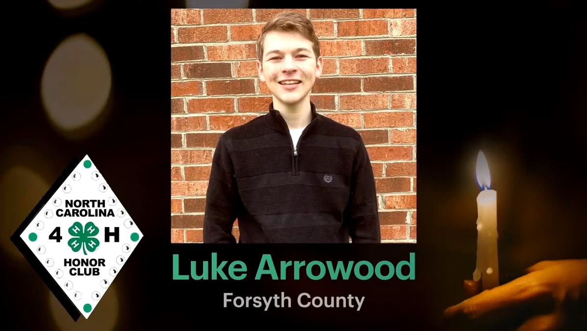 Screencap of Luke Arrowood's induction into the NC 4-H Honor Club. Background is a person holding a candle, the NC 4-H Honor Club logo is to the right, and a photo of Luke Arrowood is in the center with his name and "Forsyth County" written below. 