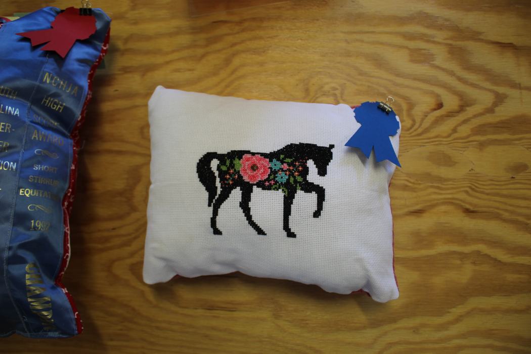 Stitched horse on a pillow