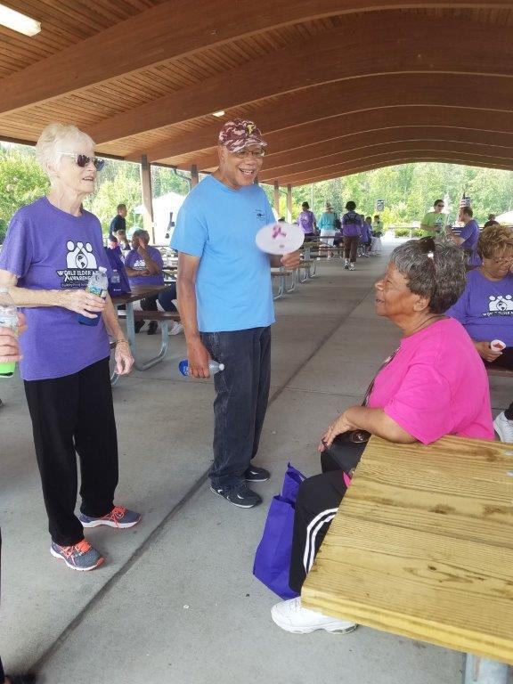 Three people talking