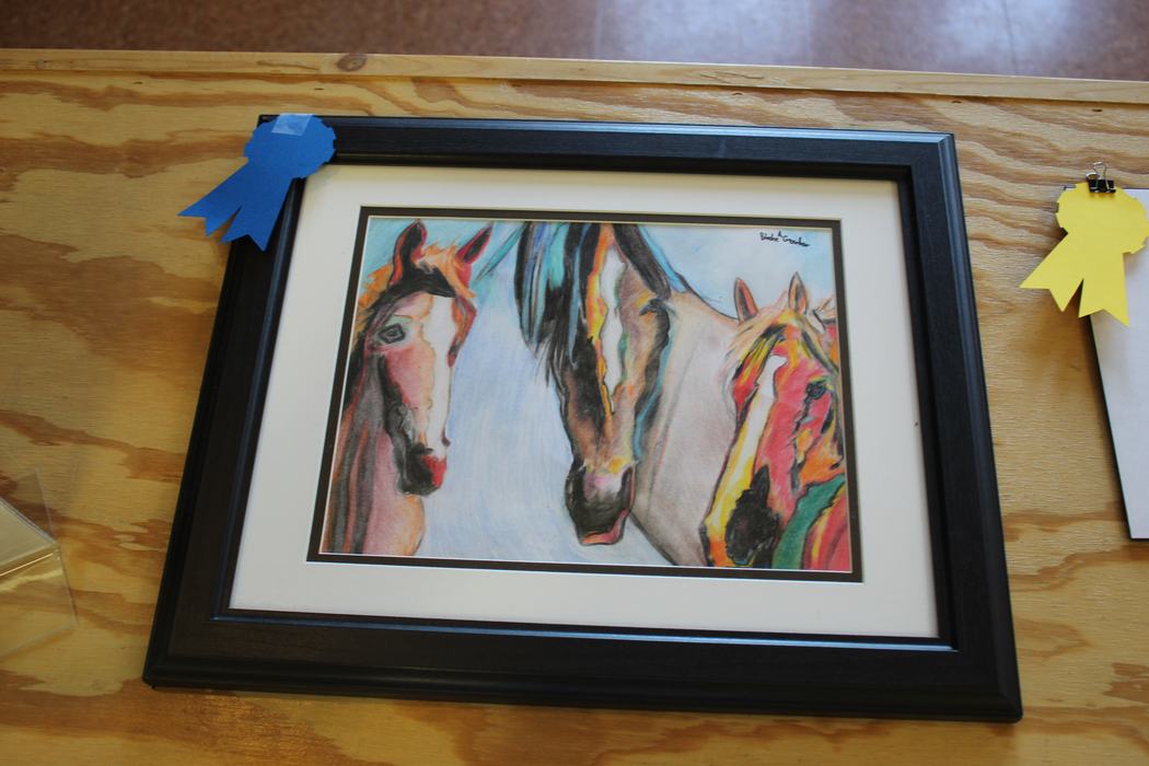 Drawing of three horses