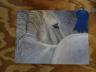 White horse painting in falling snow pinned to plywood with a blue ribbon