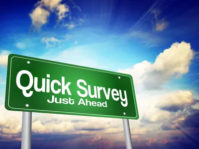 picture of sky with billboard say quick survey just ahead