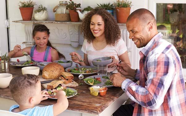Family sitting around dinner table