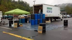 People collecting pesticide containers