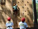 A camper at Millstone 4-H Camp tries scaling the climbing wall.