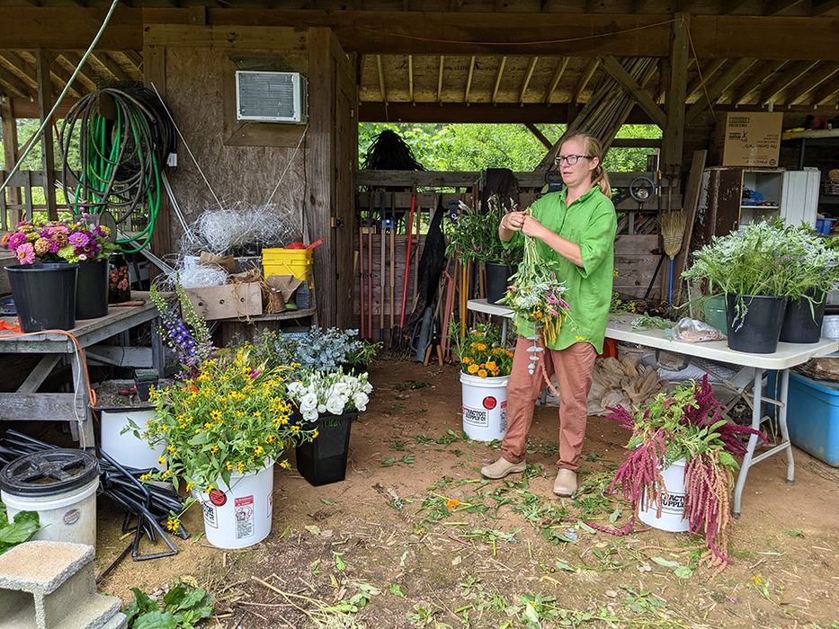 Woman making flower bouquets