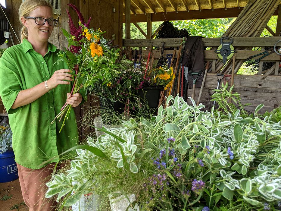 Woman holding flower bouquet