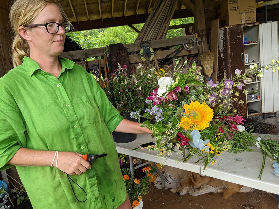 Woman showing flower bouquet