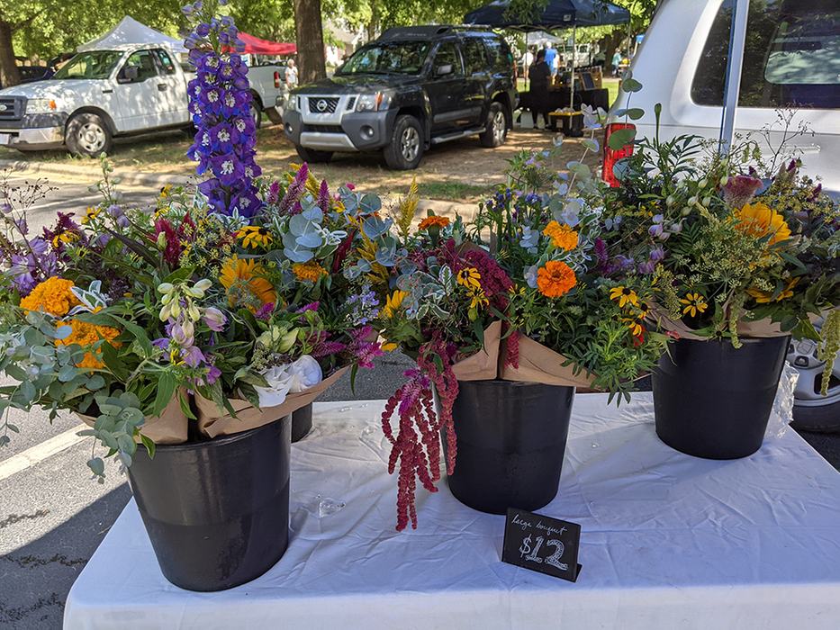Flower bouquets for sale on table