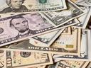 pictures of various denominations of cash