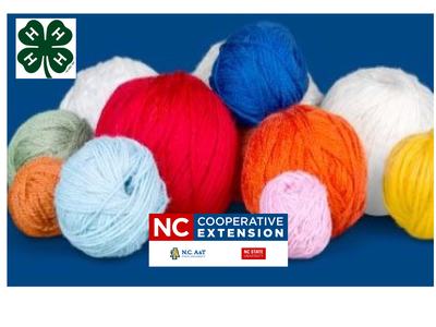 Colorful yarn balls with NC Cooperative Extension logo and 4-H four-leaf clover