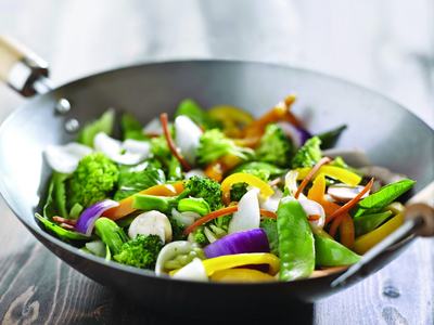 Fresh stir-fry vegetables in a wok
