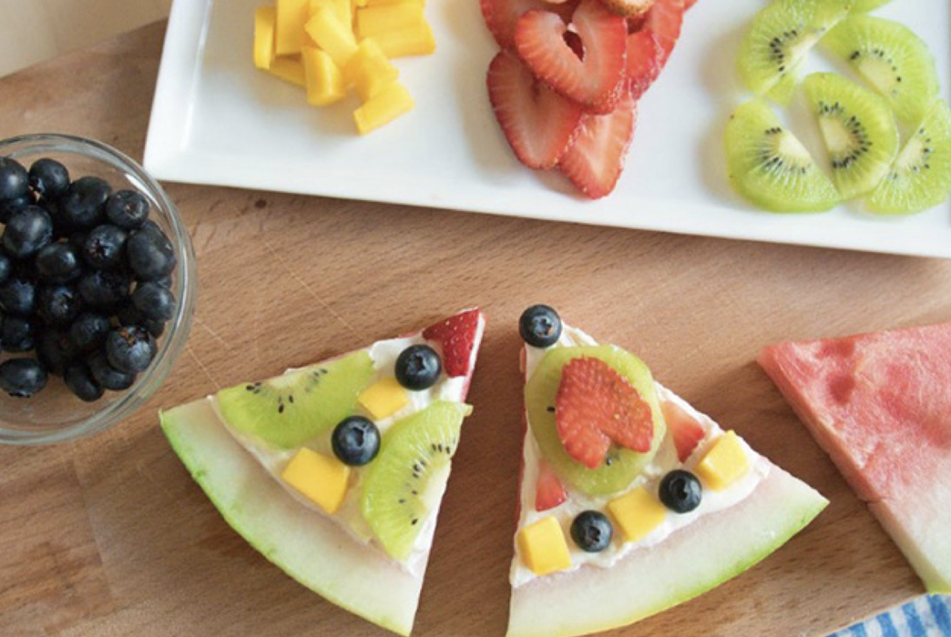 (Photo courtesy of National 4-H Council): Top watermelon slices with a spoonful of melted chocolate and smaller pieces of fruit to create a nutritious, kid-friendly treat.
