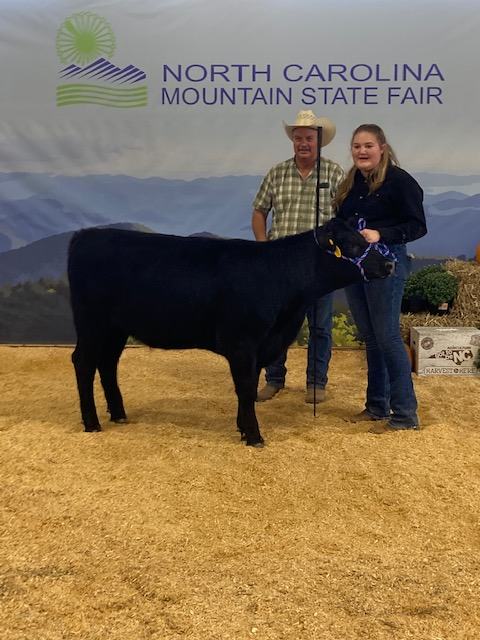 Girl with Dairy Steer at Mountain State Fair