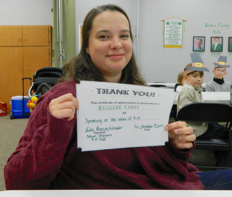 Woman holding certificate