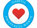 Red heart centered inside blue ring reading "DIABETES AWARENESS MONTH"