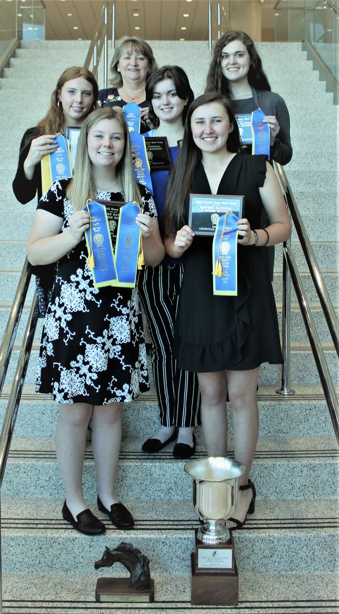 Girls with ribbons on stairs